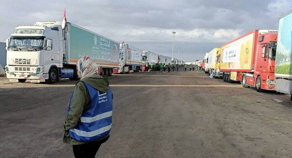 Trucks carrying humanitarian aid for Gaza wait at Rafah on the Egypt-Gaza border, October 17, 2023. Photo credit: REUTERS.