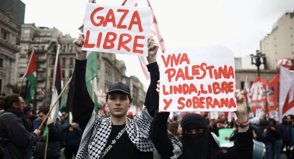 People hold signs reading "Gaza Free" and "Long live Palestine, beautiful, free and sovereign" at a pro-Palestinian march in Buenos Aires, Argentina, November 3, 2023. Photo credit: REUTERS/Tomas Cuesta