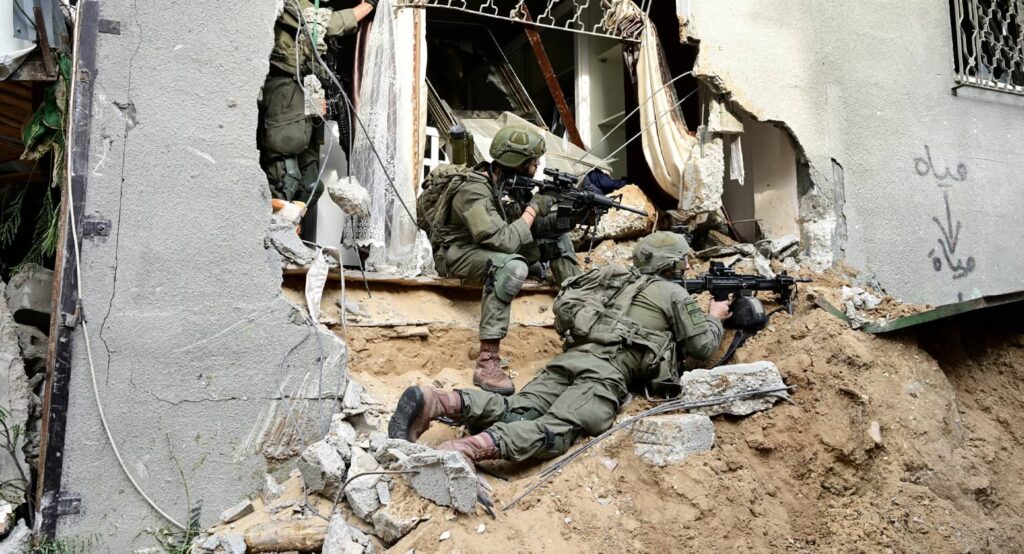 Israeli soldiers in the Shajaiya district of Gaza, December 8, 2023. Photo credit: REUTERS/Yossi Zeliger.