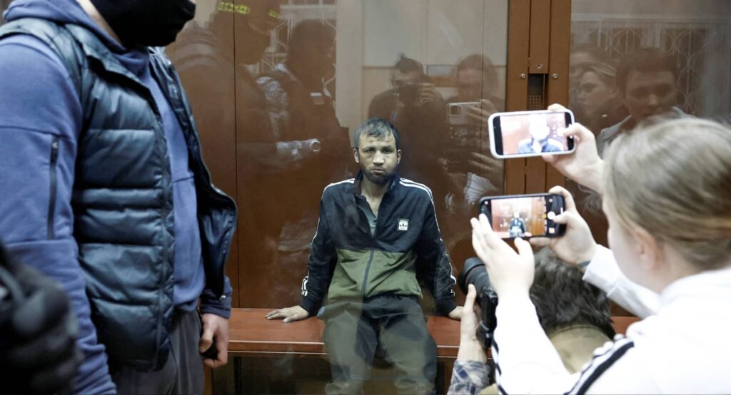 A suspect in the shooting attack before a court hearing in Moscow, Russia, March 25, 2024. Photo credit: REUTERS/Shamil Zhumatov.