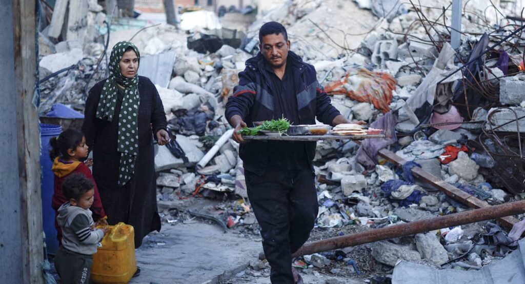 Palestinians during Ramadan in Rafah, southern Gaza Strip, March 2024. Photo credit: REUTERS/Mohammed Salem.