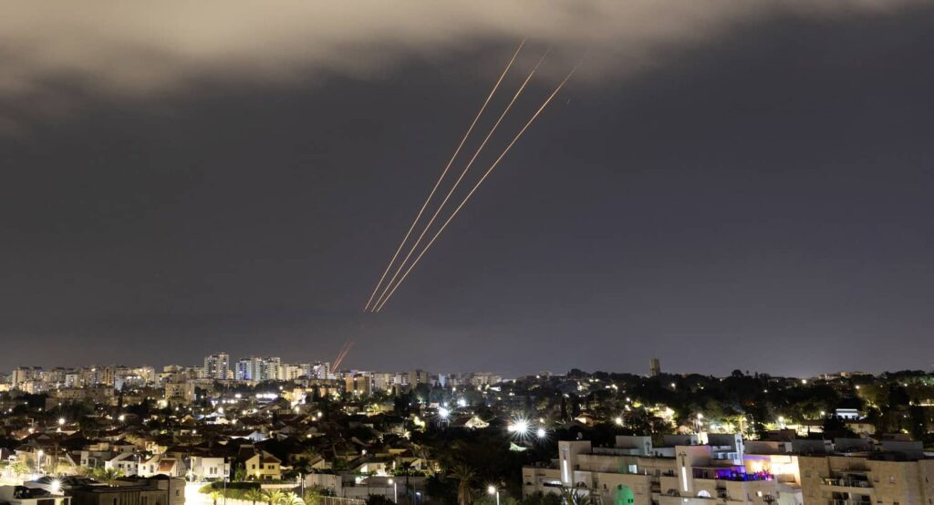 Israel's Arrow 3 interceptors operate against long-range Iranian missiles over the city of Ashkelon, Israel in the early morning hours of April 14, 2024. Photo credit: REUTERS/Amir Cohen