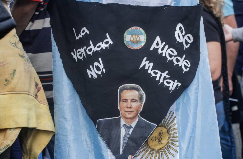 A sign at a protest in Argentina, with photo of Alberto Nisman, that reads “The truth cannot be killed,” October 2023. Photo credit: Cristobal Basaure Araya / SOPA Images/Sipa USA via Reuters Connect.