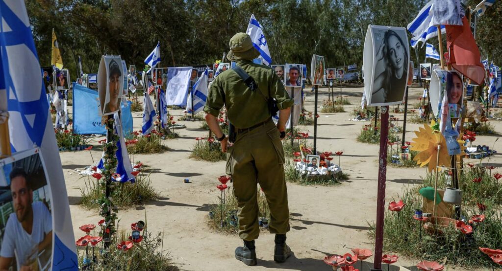 Soldiers visit the site of the Nova Music Festival. Photo credit: REUTERS/Hannah McKay (Photo is used as a representation and does not depict anyone involved in the article.)